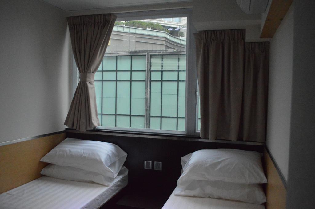 Modern Inn Гонконг Номер фото